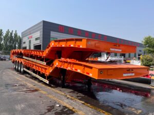 Customized 4 axle lowbed semi trailer with dolly for Benin mining heavy equipment transport