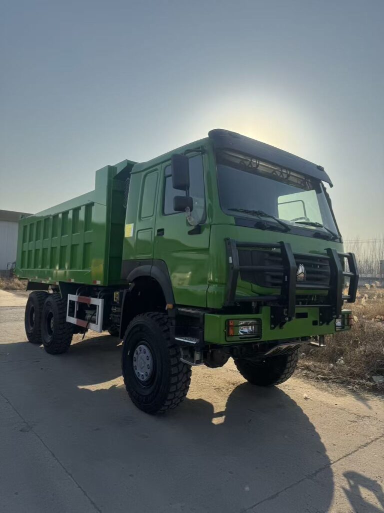 Heavy duty green HOWO 6x6 dump truck purchased by Oman client at HICA Vehicle