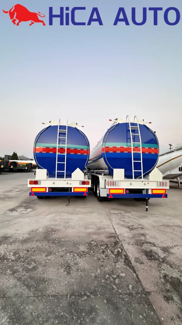 Rear view of 3-axle fuel tanker semi-trailer with access ladders and safety bumpers by HICA AUTO