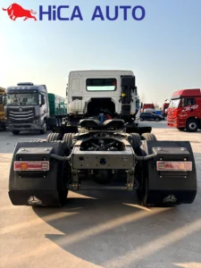 Rear view of SINOTRUK HOWO 430HP 6x4 tractor truck showing fifth wheel saddle coupling and LED tail lights