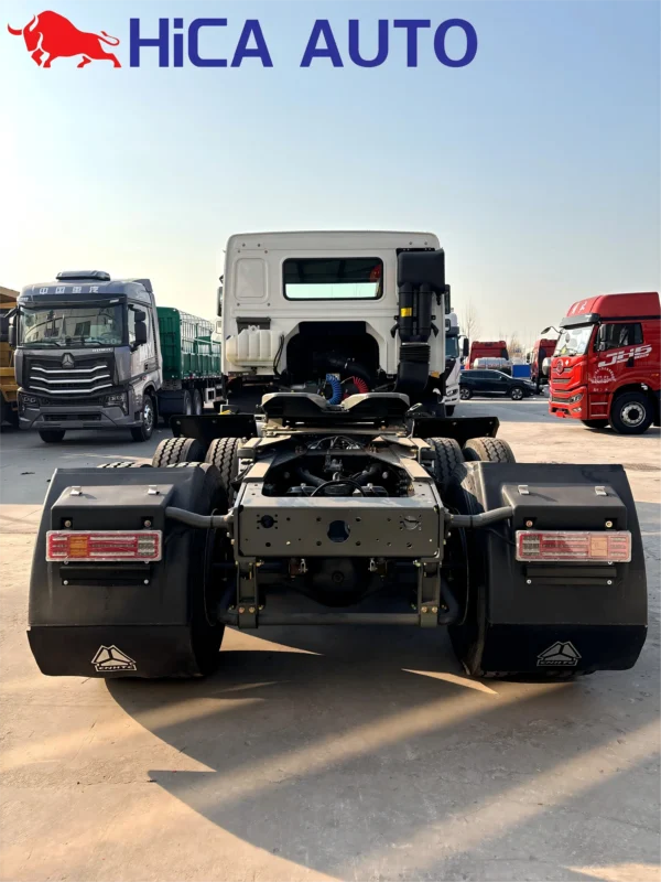Rear view of SINOTRUK HOWO 430HP 6x4 tractor truck showing fifth wheel saddle coupling and LED tail lights