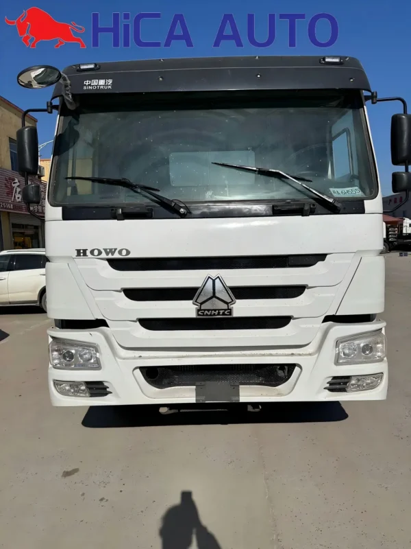 Front view of white SINOTRUK HOWO 430HP 6x4 tractor truck cabin with Weichai power engine