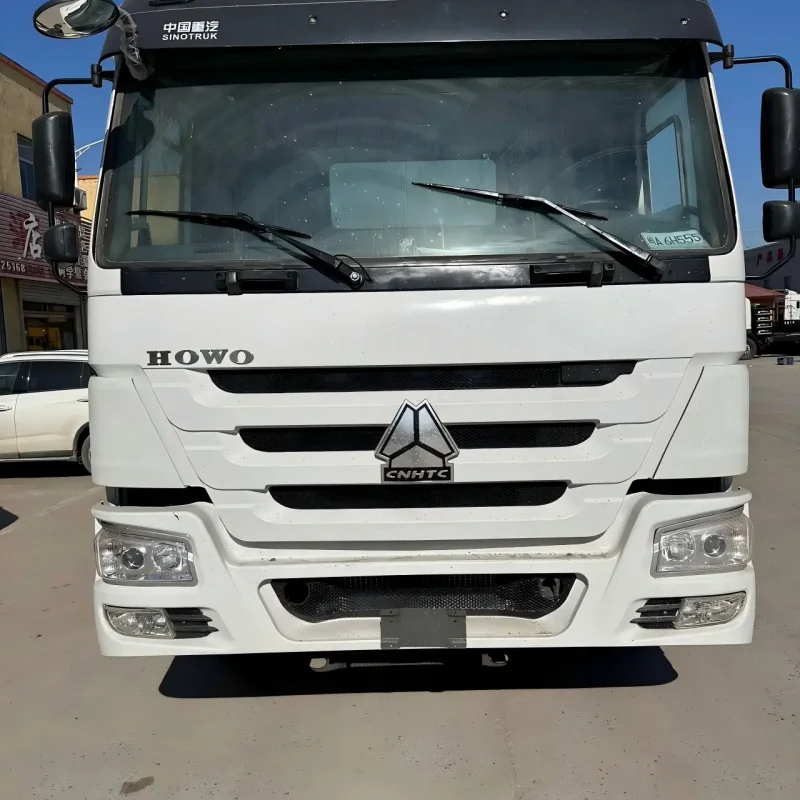 Front view of white SINOTRUK HOWO 430HP 6x4 tractor truck cabin with Weichai power engine